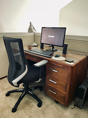 A vintage desk with a computer